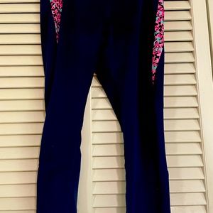 Under armor navy leggings and royal blue and black and white zig zag